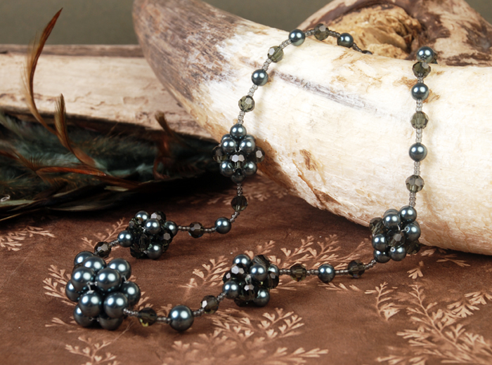 Swarovski pearls in stitched necklace
